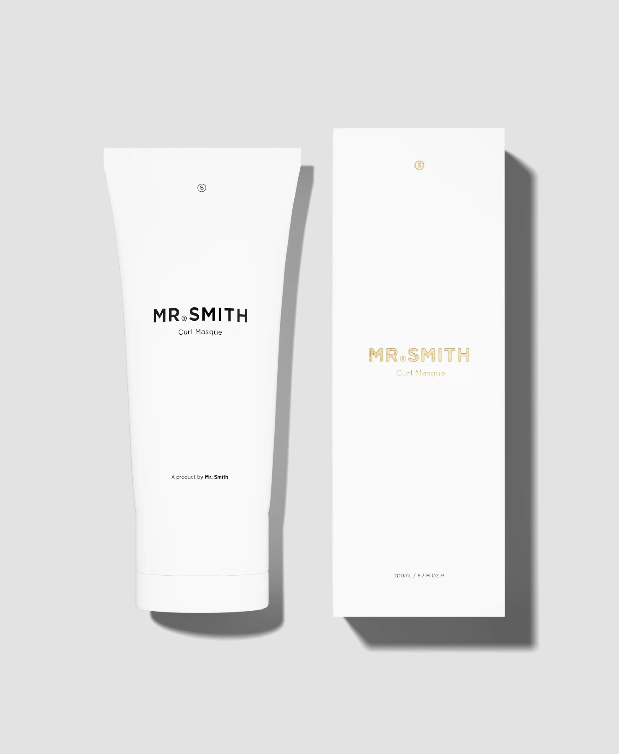 Two 'MR. SMITH' product packages on a light gray background