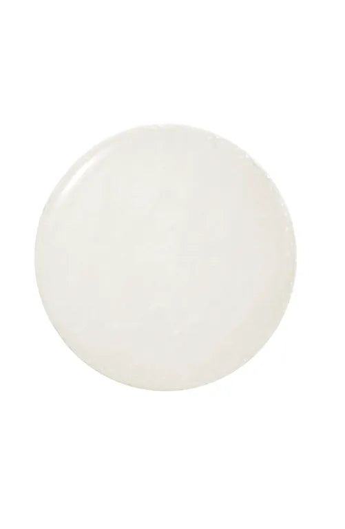 A circular, glossy white cabochon or button on a solid white background.