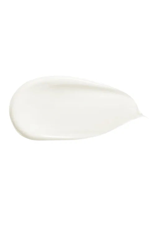 A smooth, creamy white product swatch, likely a cosmetic cream or lotion smear, shown on a solid white background.