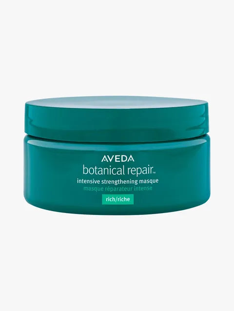 A jar of Aveda Botanical Repair Intensive Strengthening Masque in the rich/riche variant, shown against a plain light gray background.