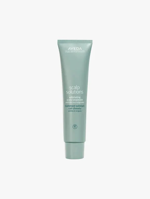 A tube of Aveda Scalp Solutions Scalp Treatment Exfoliating Shampoo on a light gray background.