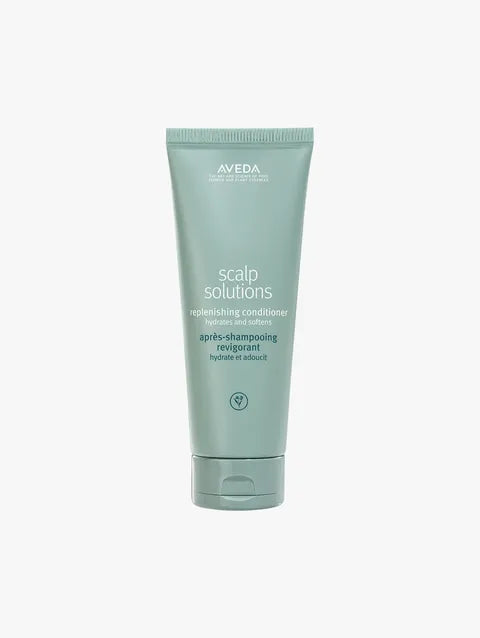 Aveva Scalp Solutions Refreshing Conditioner in a light sage green squeeze tube, centered on a plain white background.