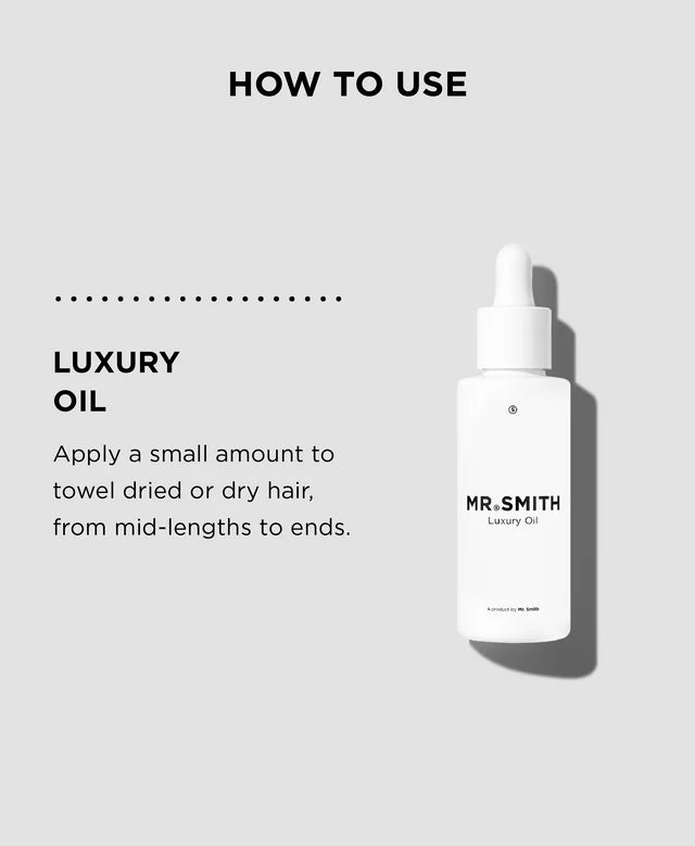 Bottle of Mr. Smith Luxury Oil with usage instructions on a light gray background