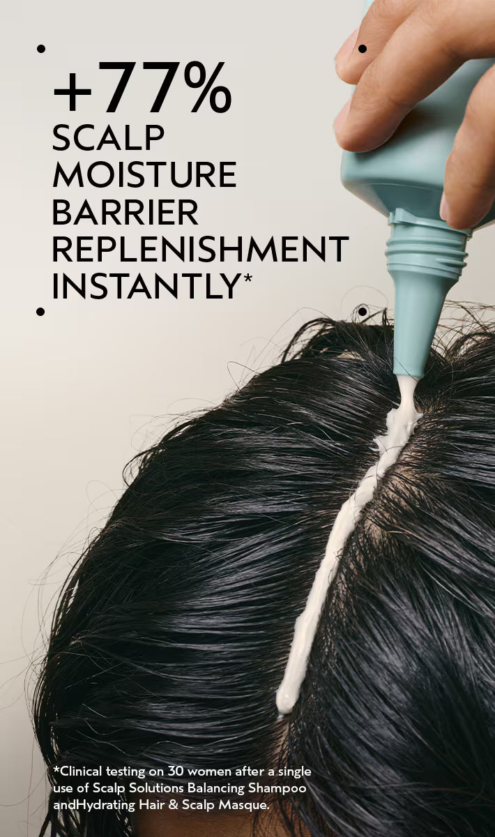 Person applying a scalp treatment with text about scalp moisture barrier replenishment.