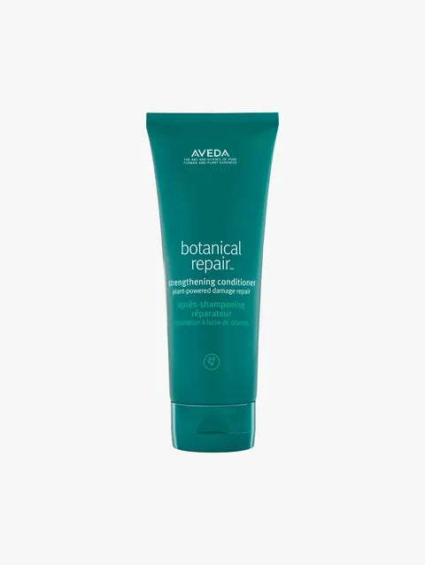 Aveva Botanical Repair Strengthening Conditioner in a teal squeeze tube, centered on a light gray background.