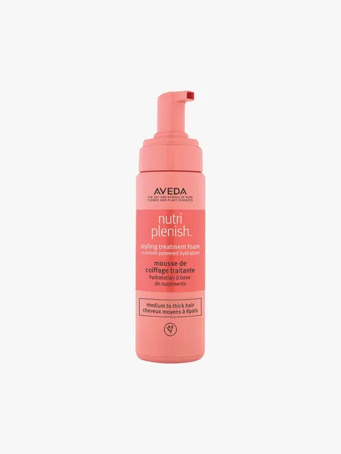 Aveva Nutri Plenish Styling Treatment Foam in a coral pink pump bottle, centered on a light gray background.