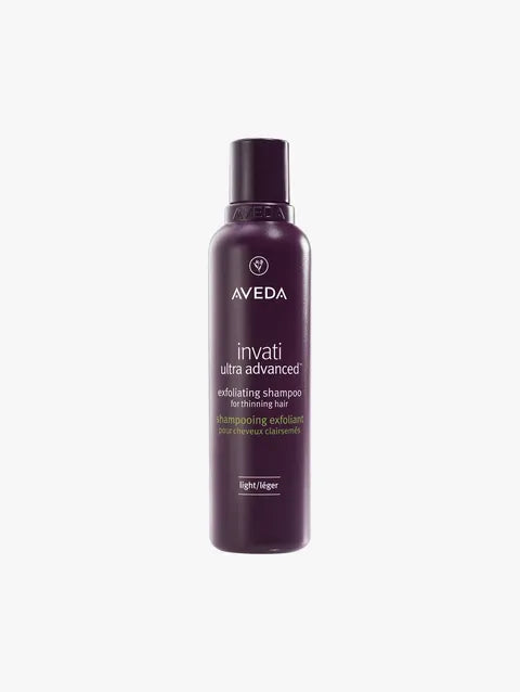 A bottle of Aveda Invati Ultra Advanced Exfoliating Shampoo for Thinning Hair, shown on a light gray background.
