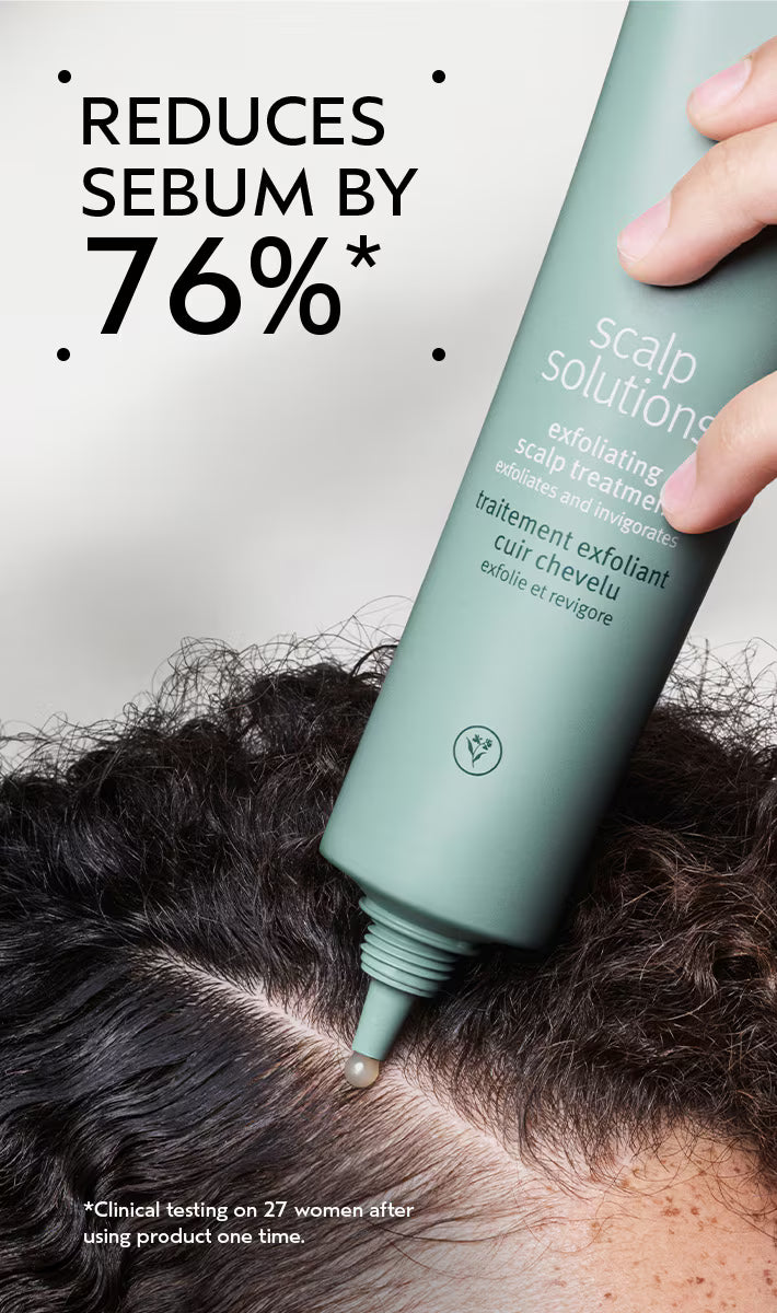 Scalp treatment bottle being applied to scalp with text indicating sebum reduction.