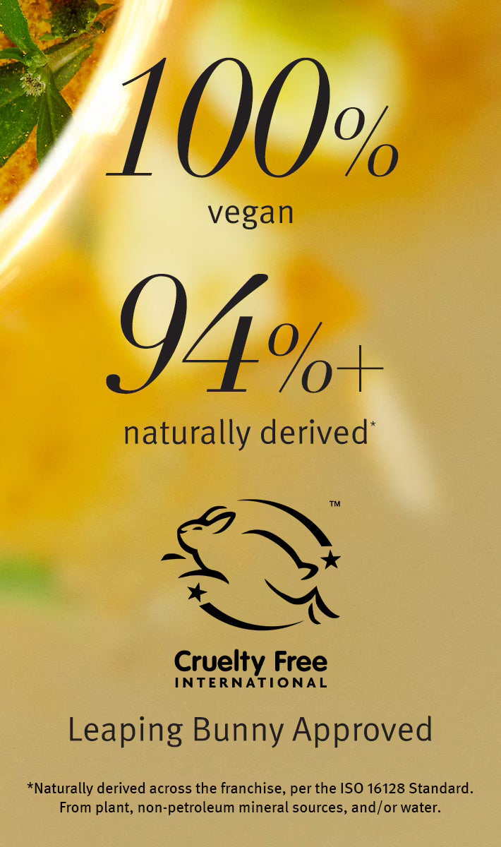 A golden-yellow graphic with large text reading '100% vegan' and '94%+ naturally derived', plus the Cruelty Free International leaping bunny logo and 'Leaping Bunny Approved' text.